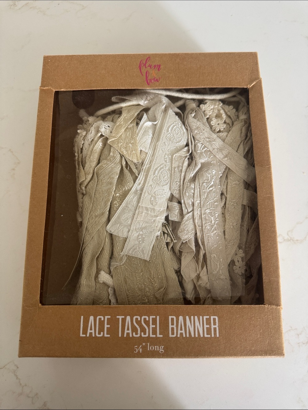 Urban Outfitters Lace Tassel Banner in Cream